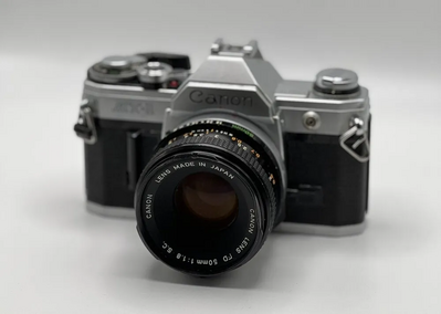 Minolta & Canon 7000i Image