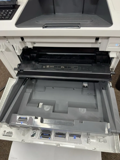 HP M608dn Image