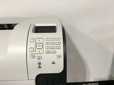 HP M602 Image