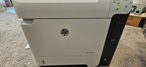 HP M602N image