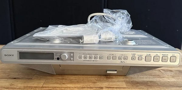 Sony Icf-cd555tv features am/fm radio, under cabinet tv image
